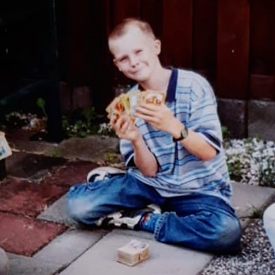 Me as a youngster, collecting and playing with Pokémon Trading Cards